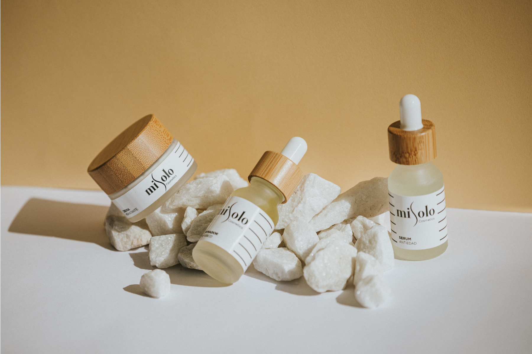 Photo of skincare products on a simple backdrop, but with a funky style. 